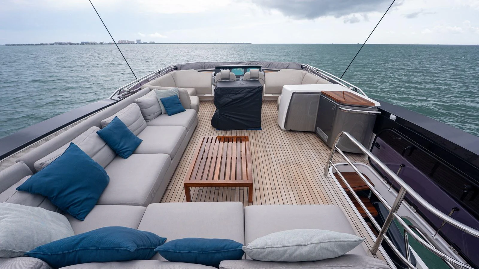 The aft deck offers a spacious and inviting area with comfortable seating and stunning ocean views. aboard PARAGON Yacht for Sale