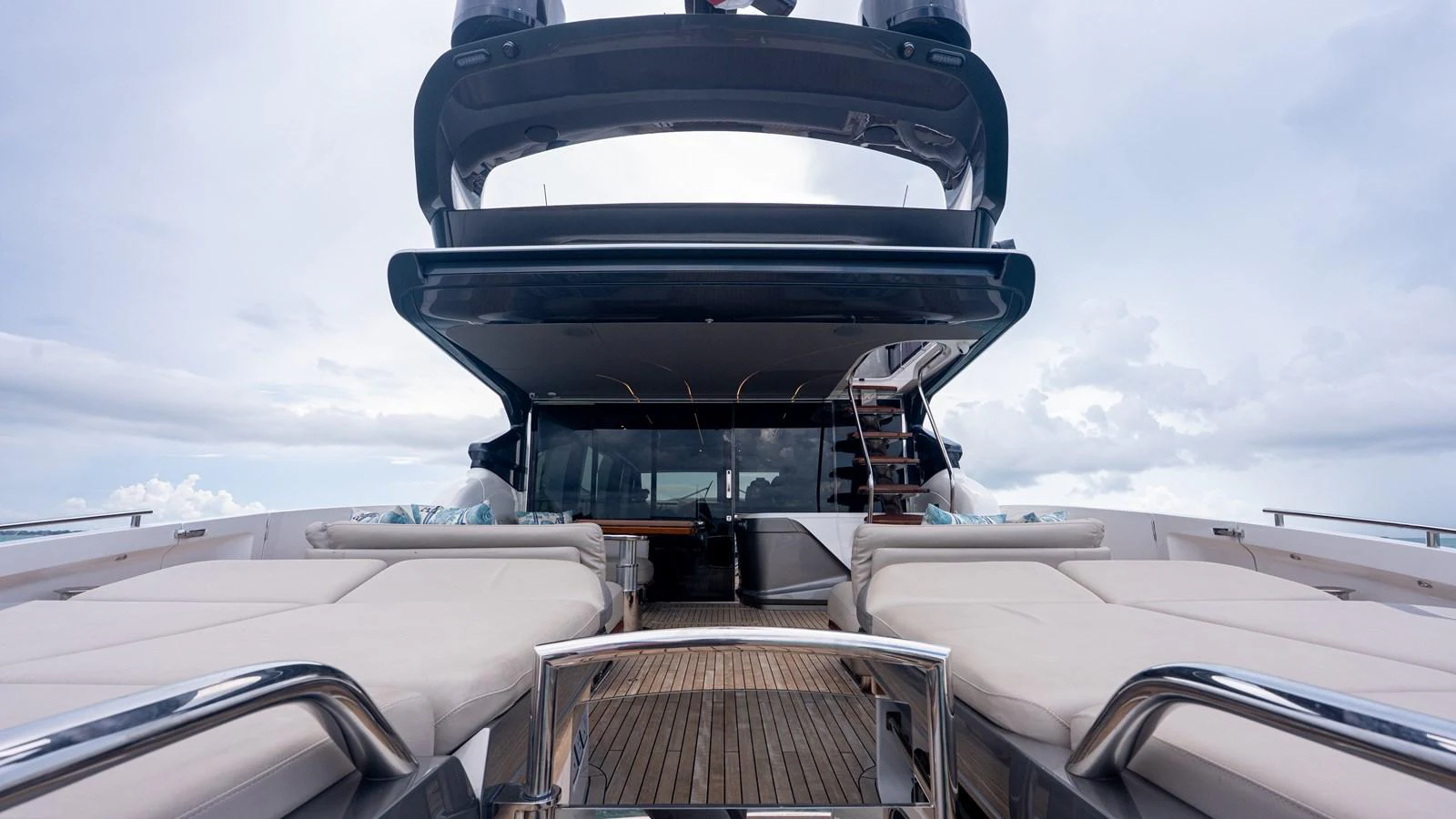 The aft deck features luxurious sun loungers and a sleek, modern design. aboard PARAGON Yacht for Sale