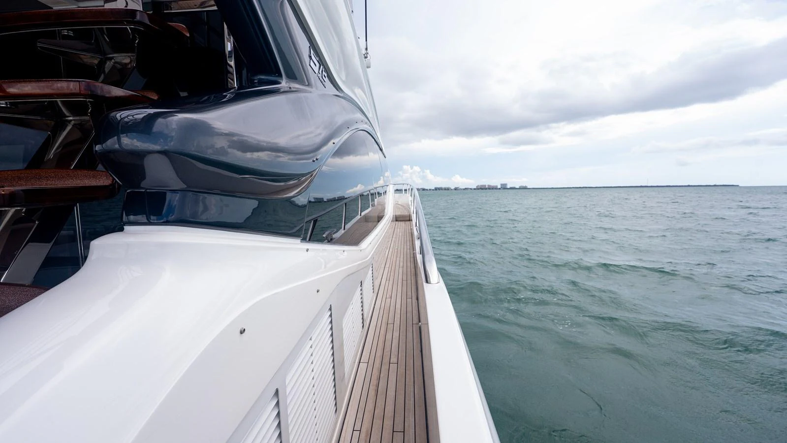 The yacht's sleek exterior showcases a modern design as it cruises on open waters. aboard PARAGON Yacht for Sale