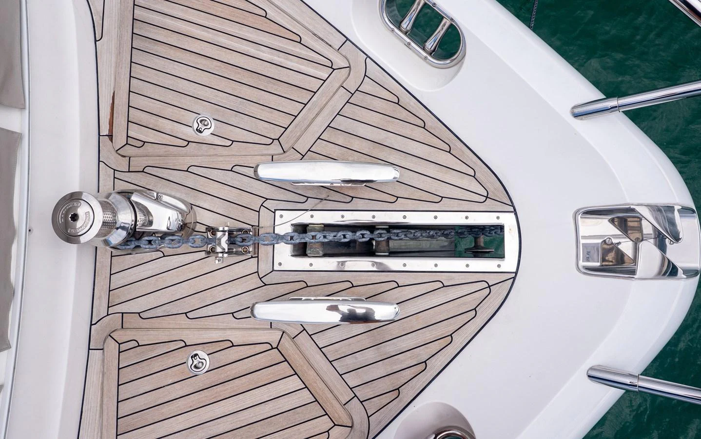 A close-up view of the yacht's bow showcasing the anchor chain and polished fittings. aboard PARAGON Yacht for Sale