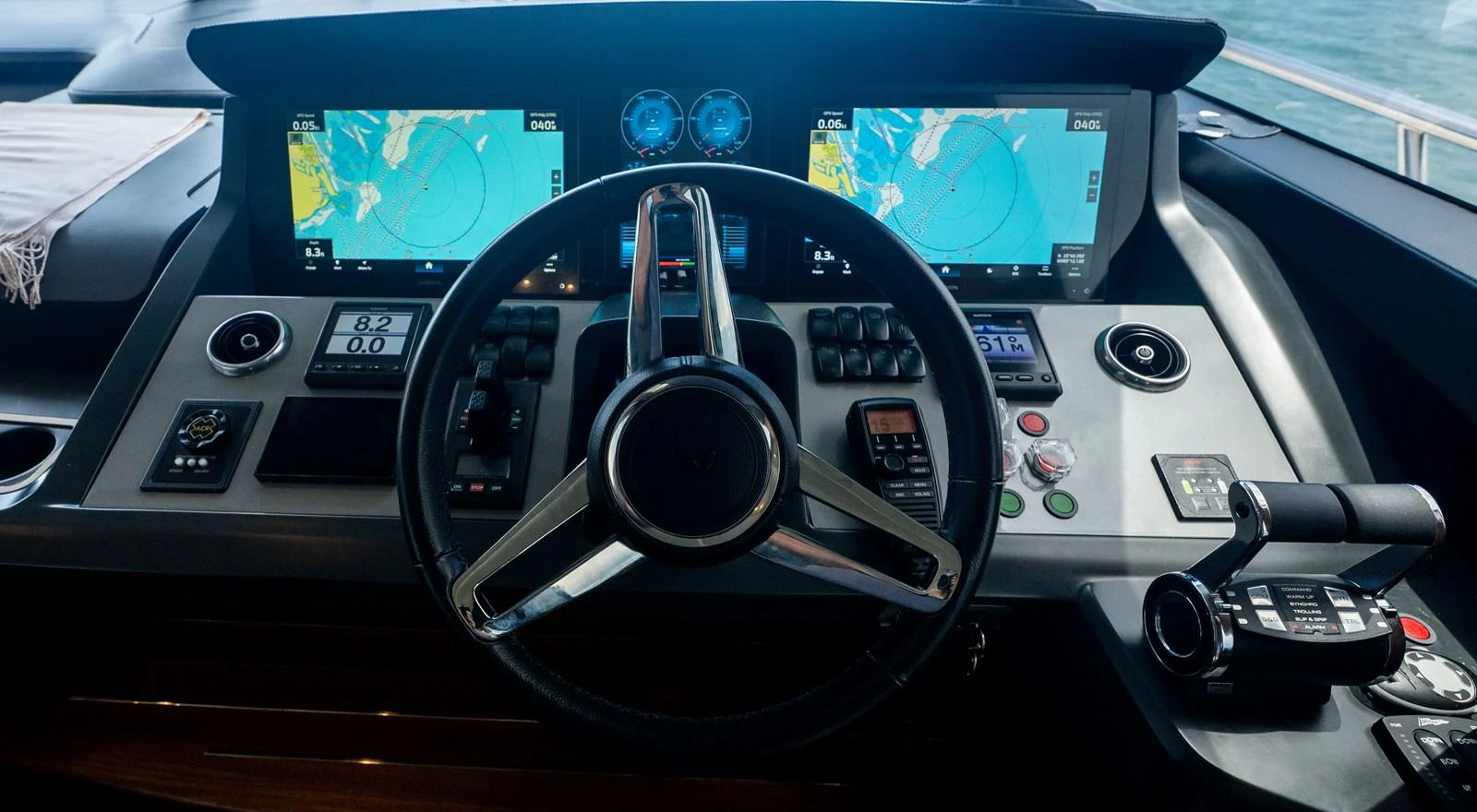 The helm station features advanced navigation equipment and a sleek steering wheel. aboard PARAGON Yacht for Sale