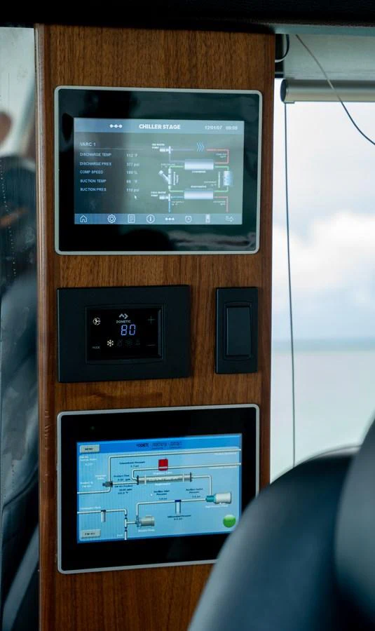 The yacht's helm features advanced control panels and navigation systems. aboard PARAGON Yacht for Sale