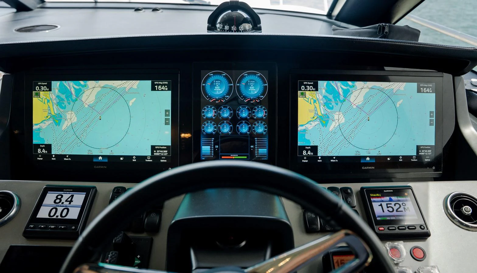 The helm features advanced navigation and control systems with multiple displays and gauges. aboard PARAGON Yacht for Sale