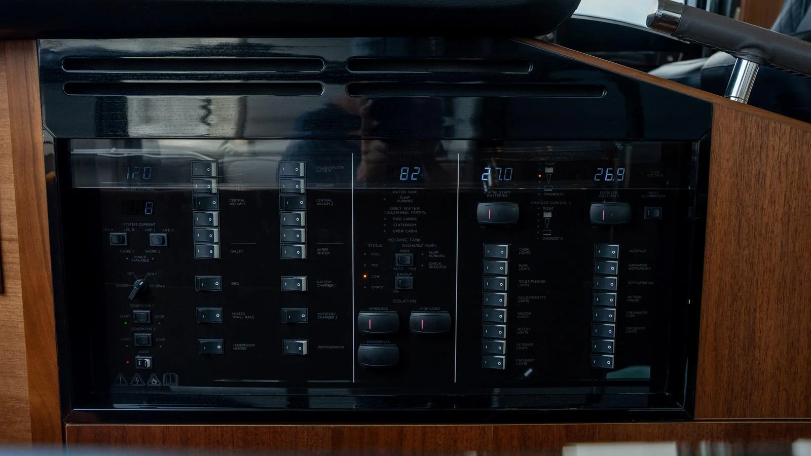 The yacht's helm features a sophisticated control panel with various instruments and switches. aboard PARAGON Yacht for Sale