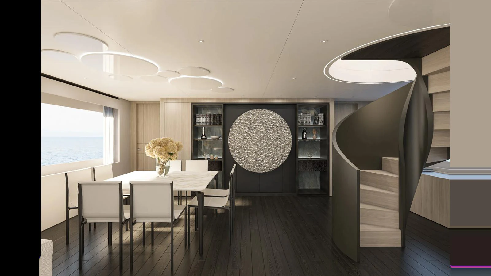 The yacht's dining area features elegant furnishings and a modern design. aboard MANDAYACHT E 09 Yacht for Sale