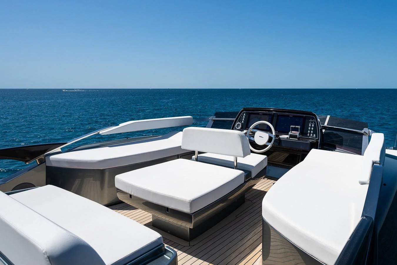 The flybridge offers a luxurious seating area with panoramic ocean views. aboard ACQUA Yacht for Sale