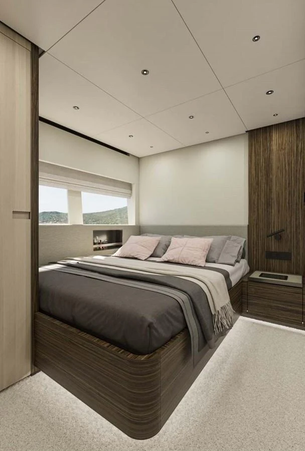 A luxurious stateroom featuring a comfortable bed with elegant bedding and modern decor. aboard MANDAYACHT S 07 BERLINETTA Yacht for Sale