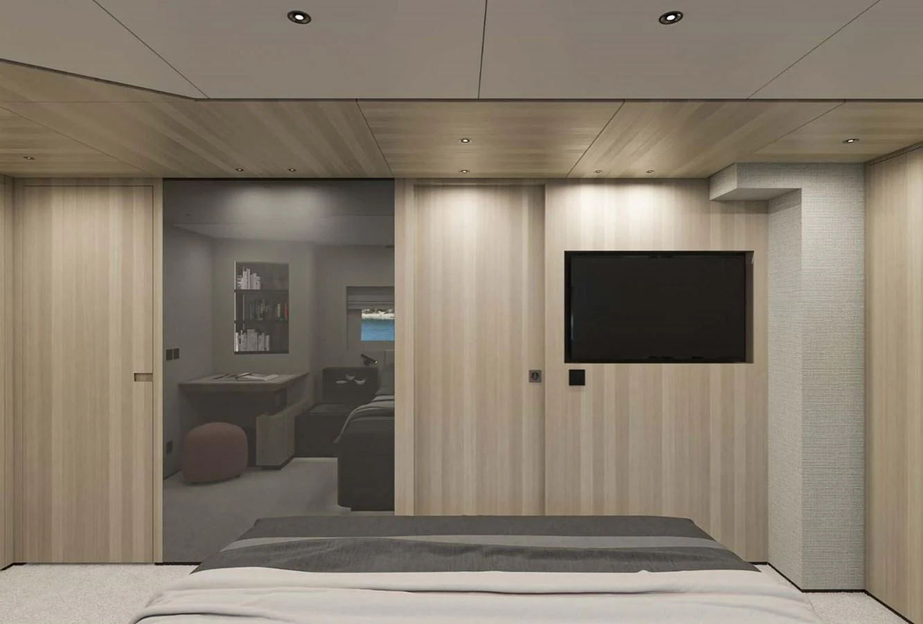 A modern stateroom featuring sleek wooden paneling and a large flat-screen TV. aboard MANDAYACHT S 07 BERLINETTA Yacht for Sale