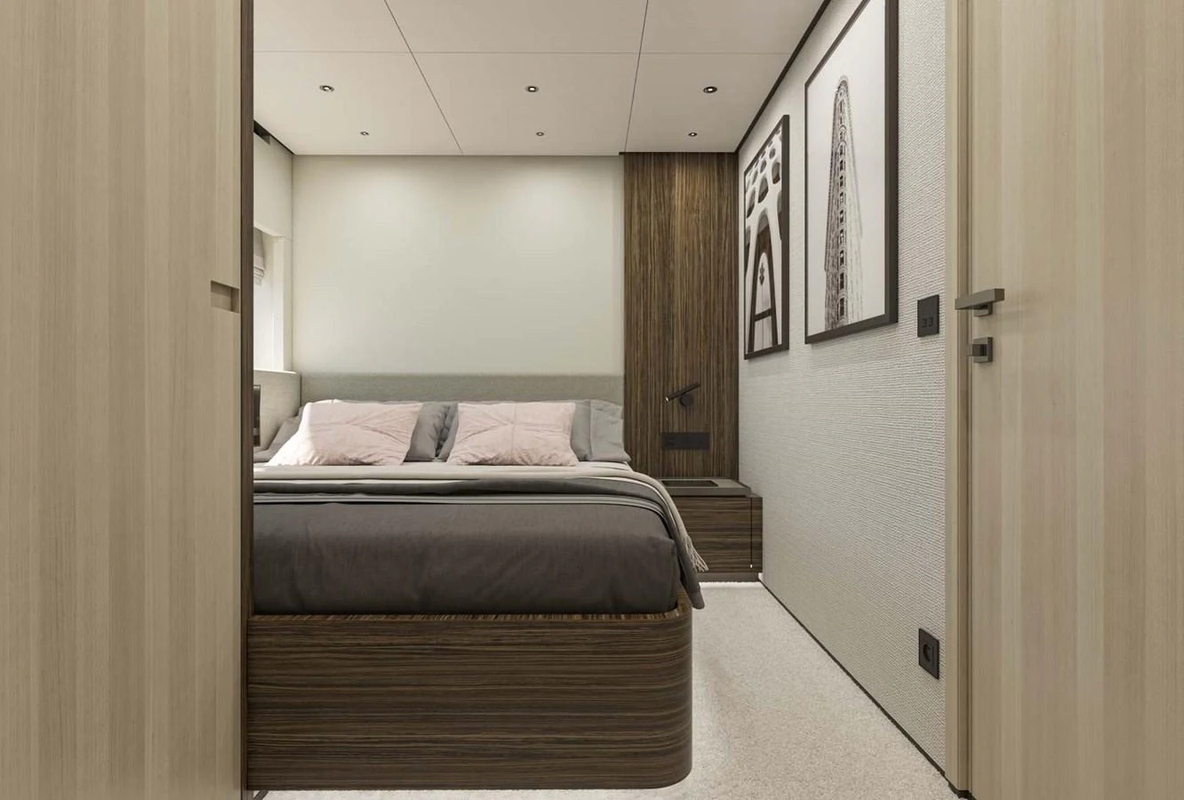 A cozy stateroom with modern decor and a comfortable bed. aboard MANDAYACHT S 07 BERLINETTA Yacht for Sale