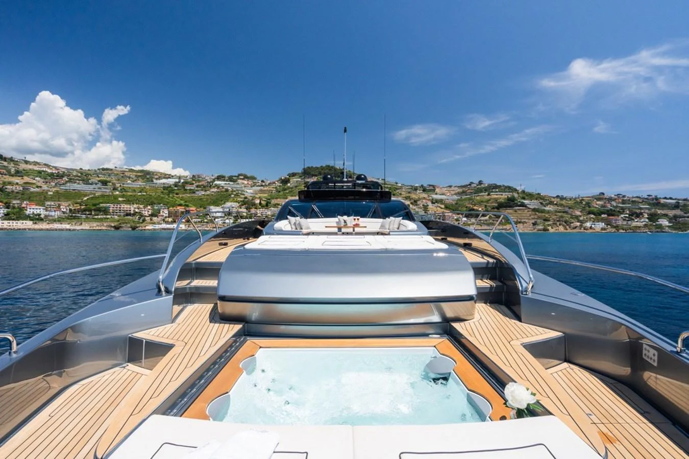 The yacht's foredeck features a luxurious jacuzzi with stunning views of the surrounding landscape. aboard JANETTE Yacht for Sale