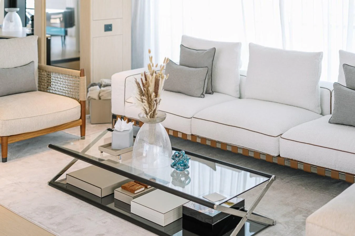 The salon features a modern and comfortable seating area with elegant decor. aboard RAISA Yacht for Sale