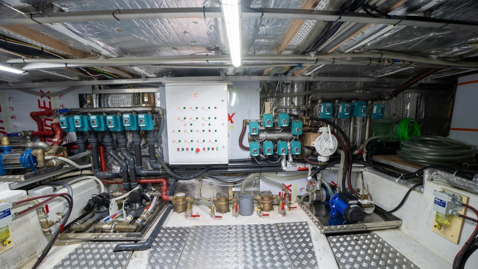 The engine room is equipped with advanced machinery and control panels, showcasing the yacht's technical prowess. aboard TROYWIZARD Yacht for Sale