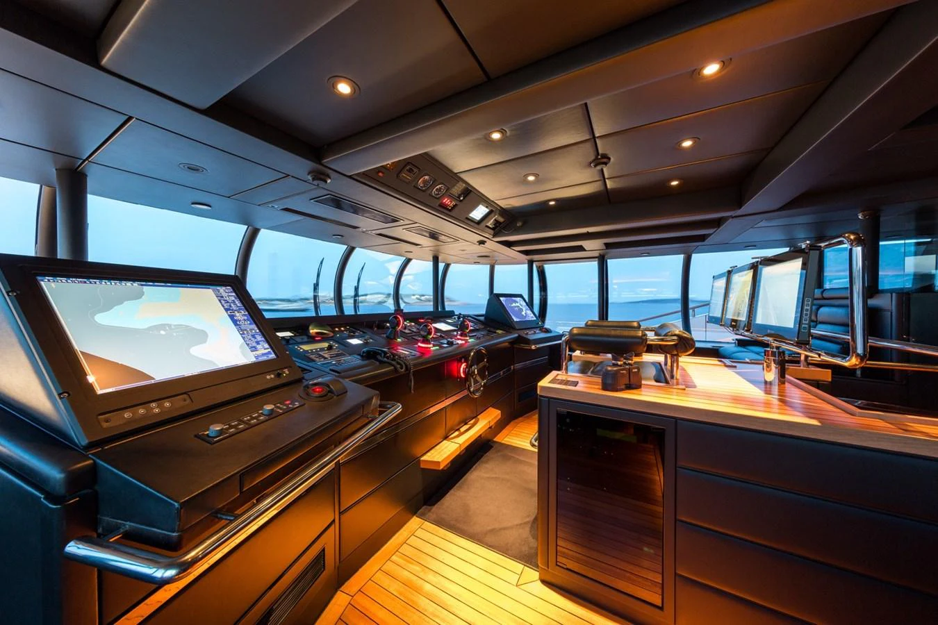 The helm features state-of-the-art navigation equipment and luxurious finishes. aboard ZEUS Yacht for Sale