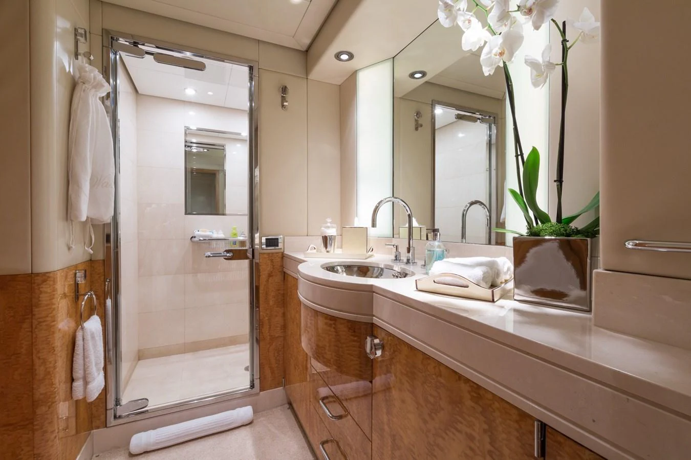 The bathroom features elegant fixtures and a sophisticated design. aboard ZEUS Yacht for Sale