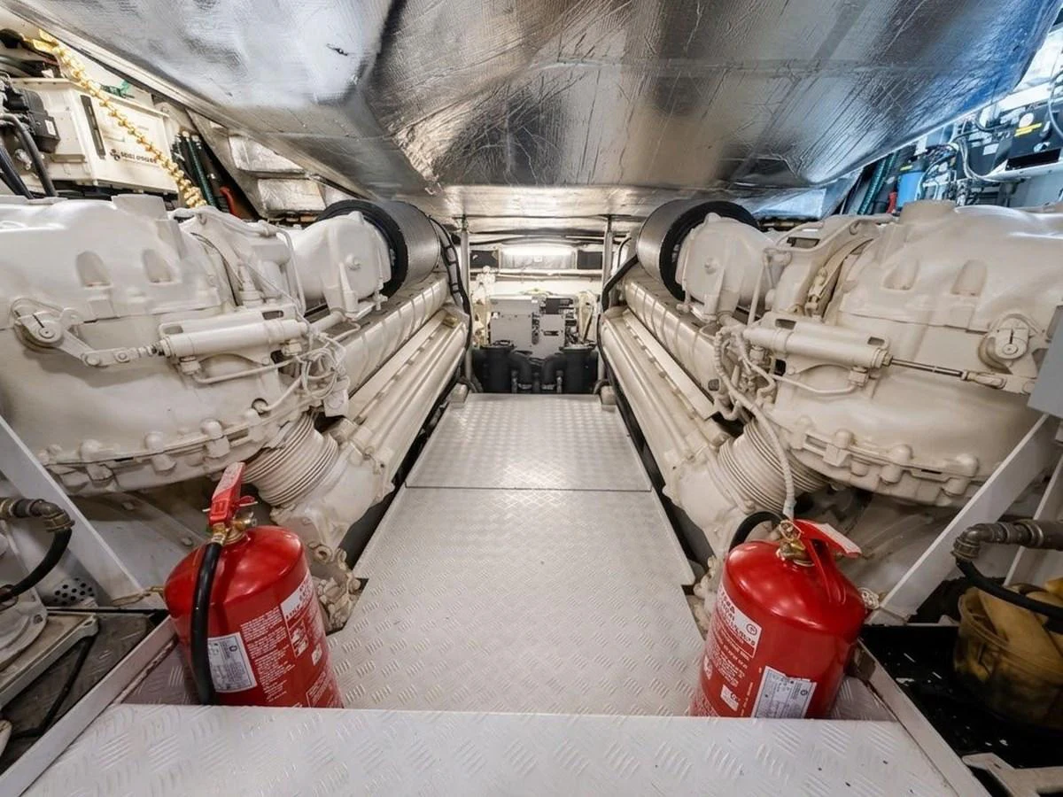 The engine room showcases powerful twin engines and essential safety equipment. aboard PELAGIA Yacht for Sale