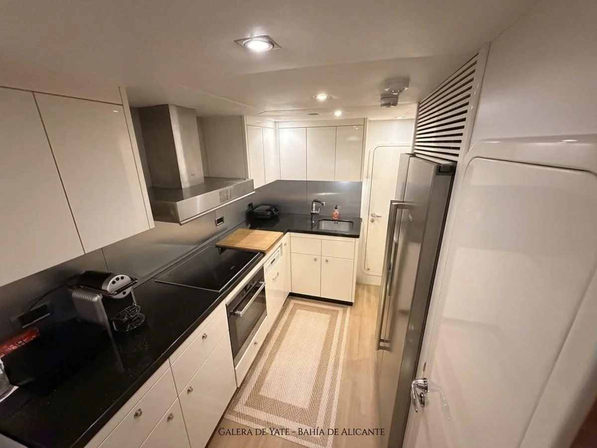 The yacht's galley is equipped with modern appliances and ample counter space, perfect for gourmet cooking at sea. aboard PELAGIA Yacht for Sale