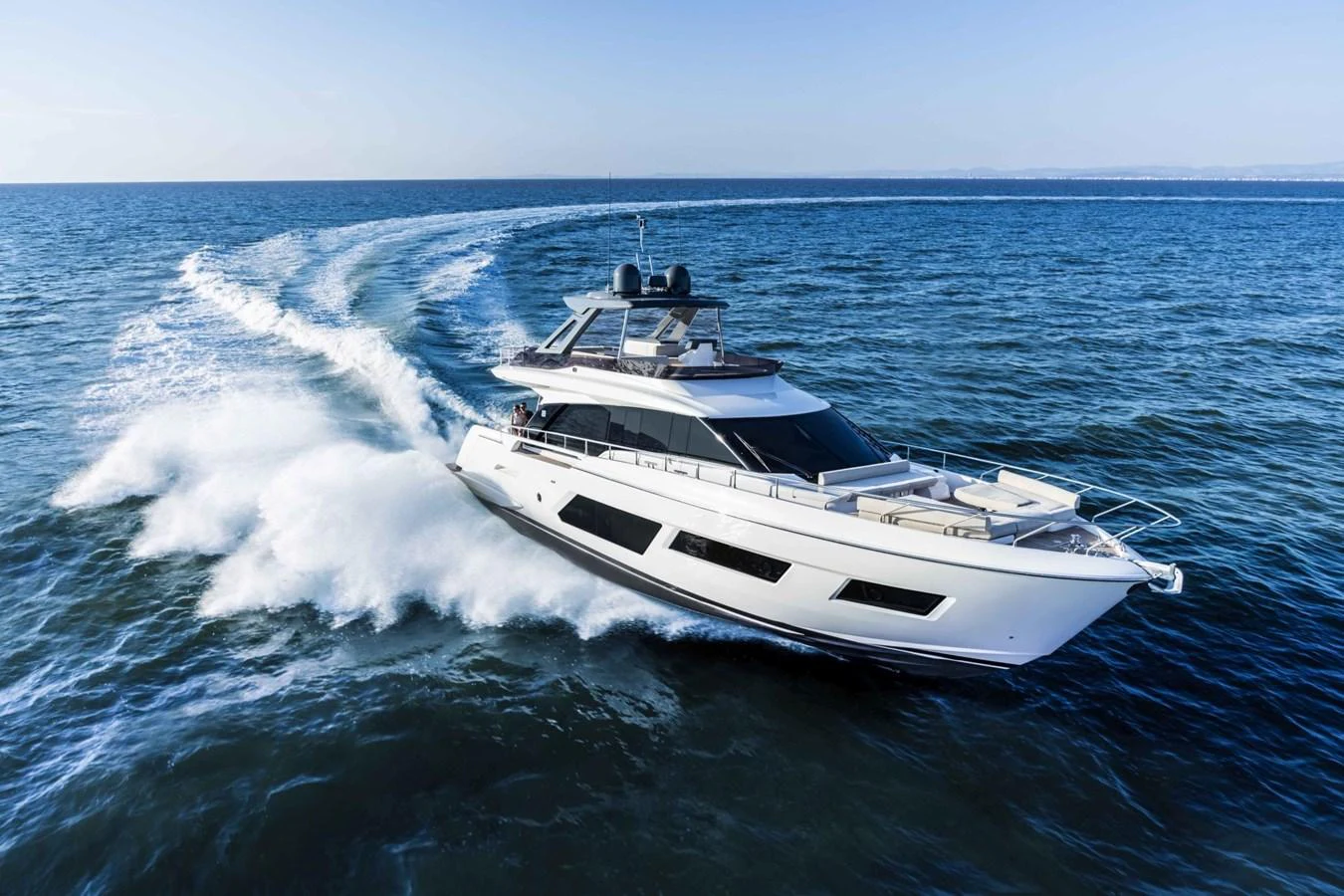 A sleek and modern yacht cruises swiftly through the open sea, showcasing its elegant design and powerful performance. aboard LIVI B Yacht for Sale