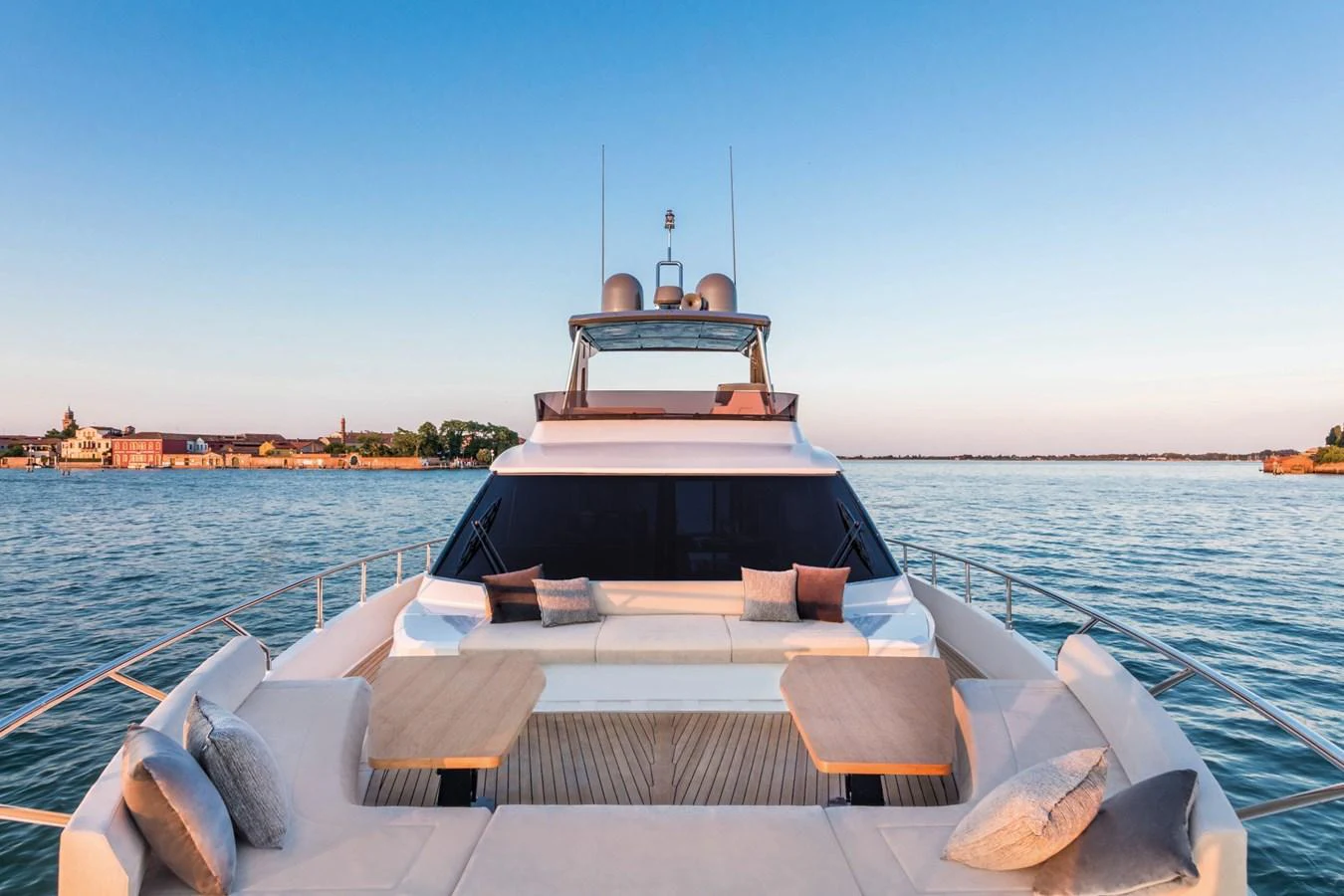 The yacht's foredeck offers a spacious and inviting area with comfortable seating and tables, perfect for relaxation and socializing. aboard LIVI B Yacht for Sale