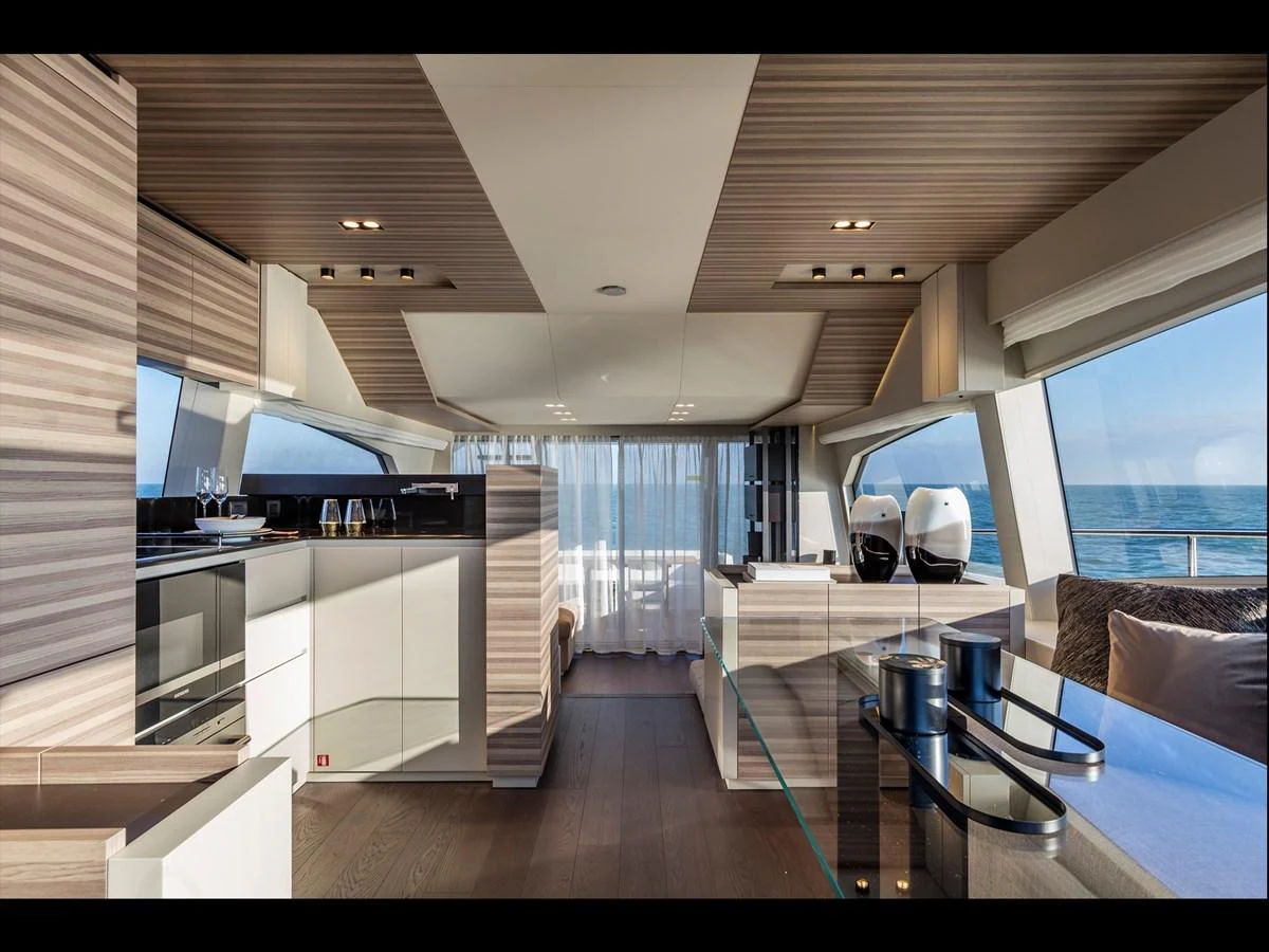 The salon offers a spacious and modern interior with panoramic views of the sea. aboard LIVI B Yacht for Sale