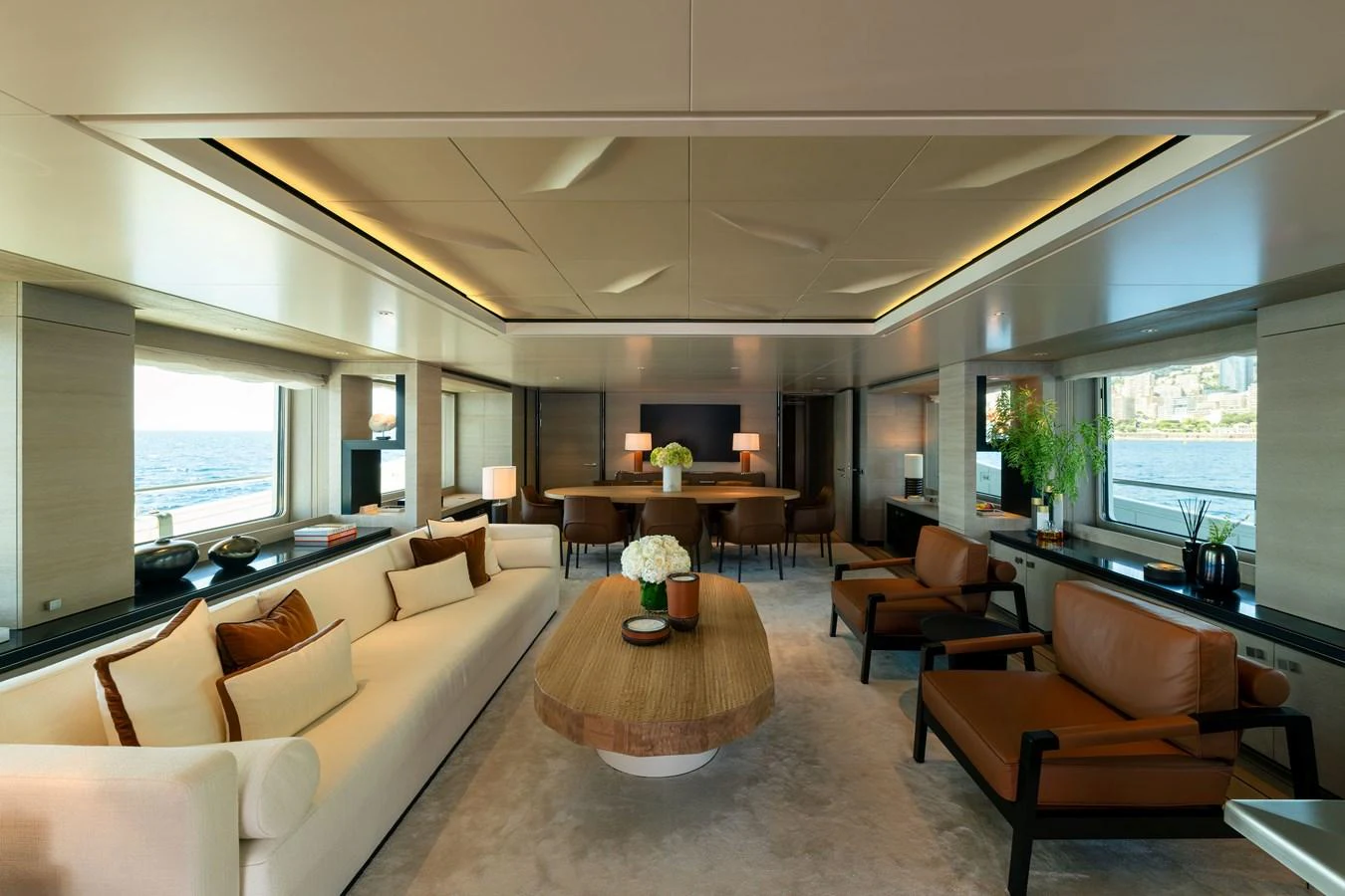 The salon offers a spacious and elegantly designed area with ample seating and natural light. aboard GRACE Yacht for Sale
