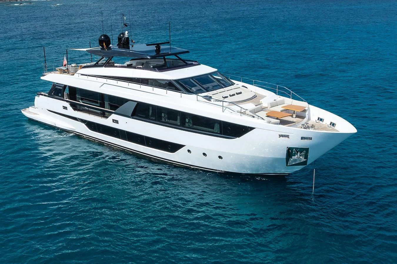 A sleek and modern yacht cruising on clear blue waters. aboard FREYA Yacht for Sale