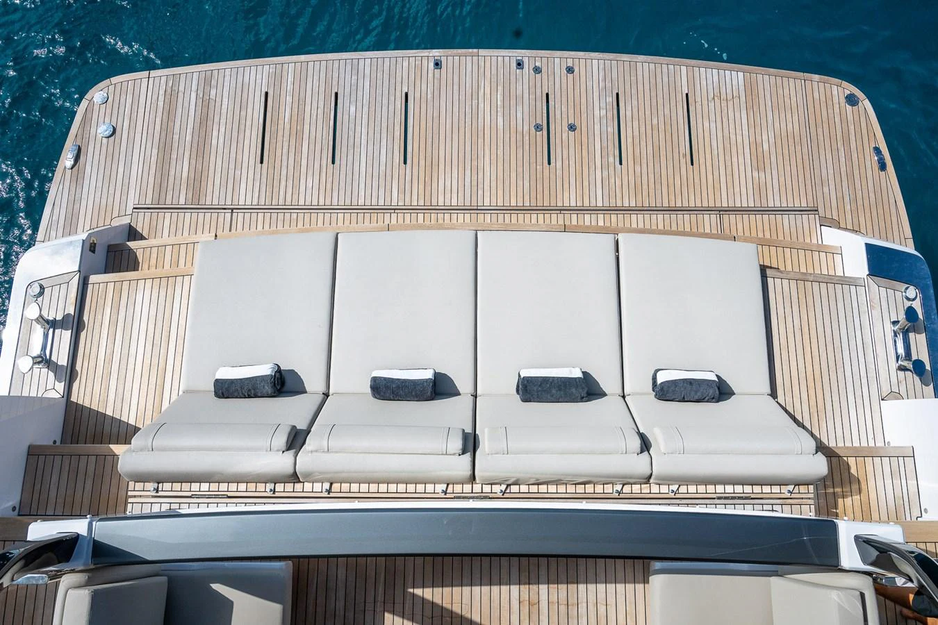 The sundeck features plush sun loungers with a view of the surrounding waters. aboard FREYA Yacht for Sale