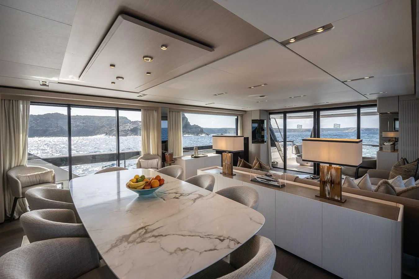 The salon offers a spacious and elegant area with panoramic views and luxurious furnishings. aboard FREYA Yacht for Sale