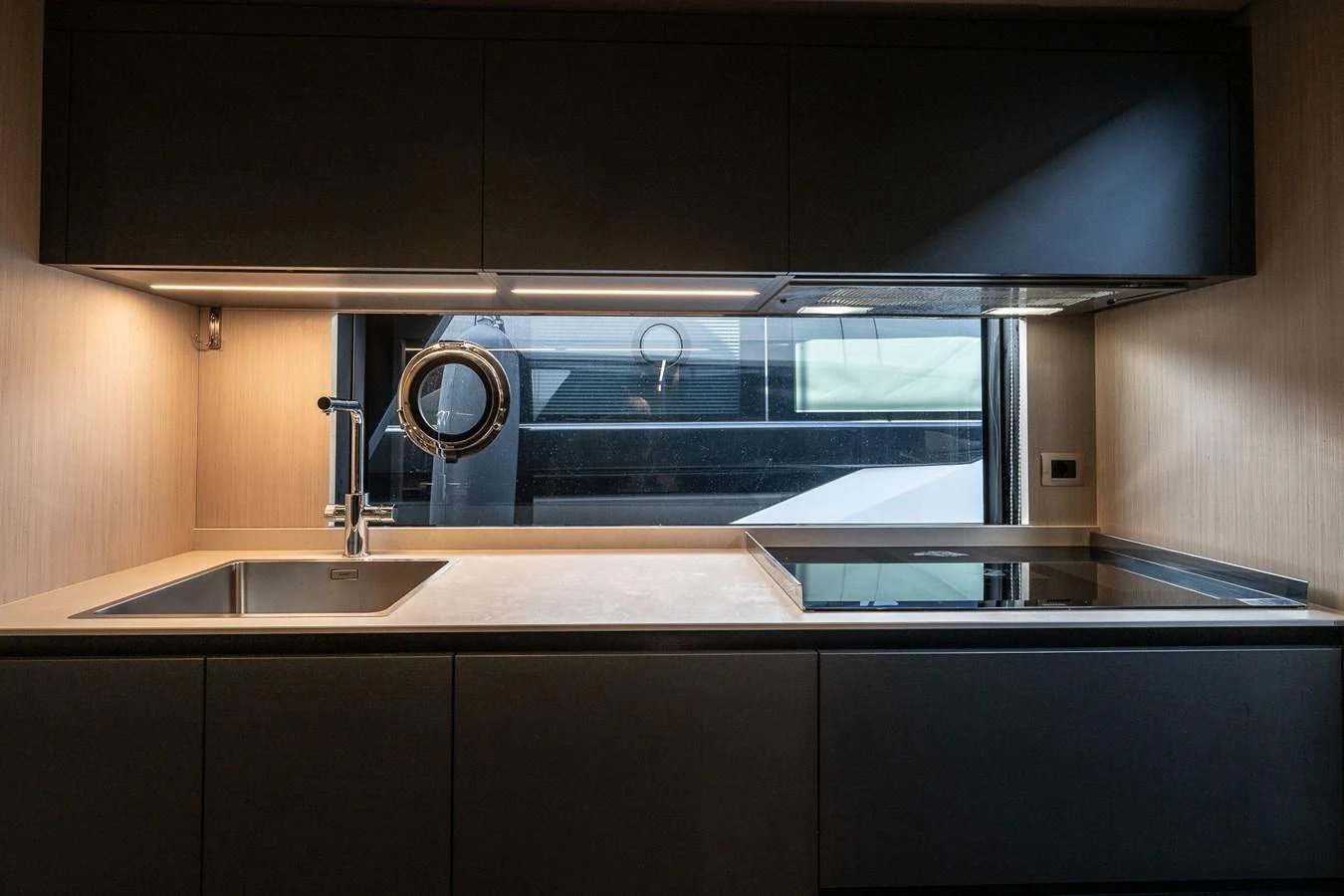 A sleek and modern galley featuring high-end appliances and ample counter space. aboard FREYA Yacht for Sale