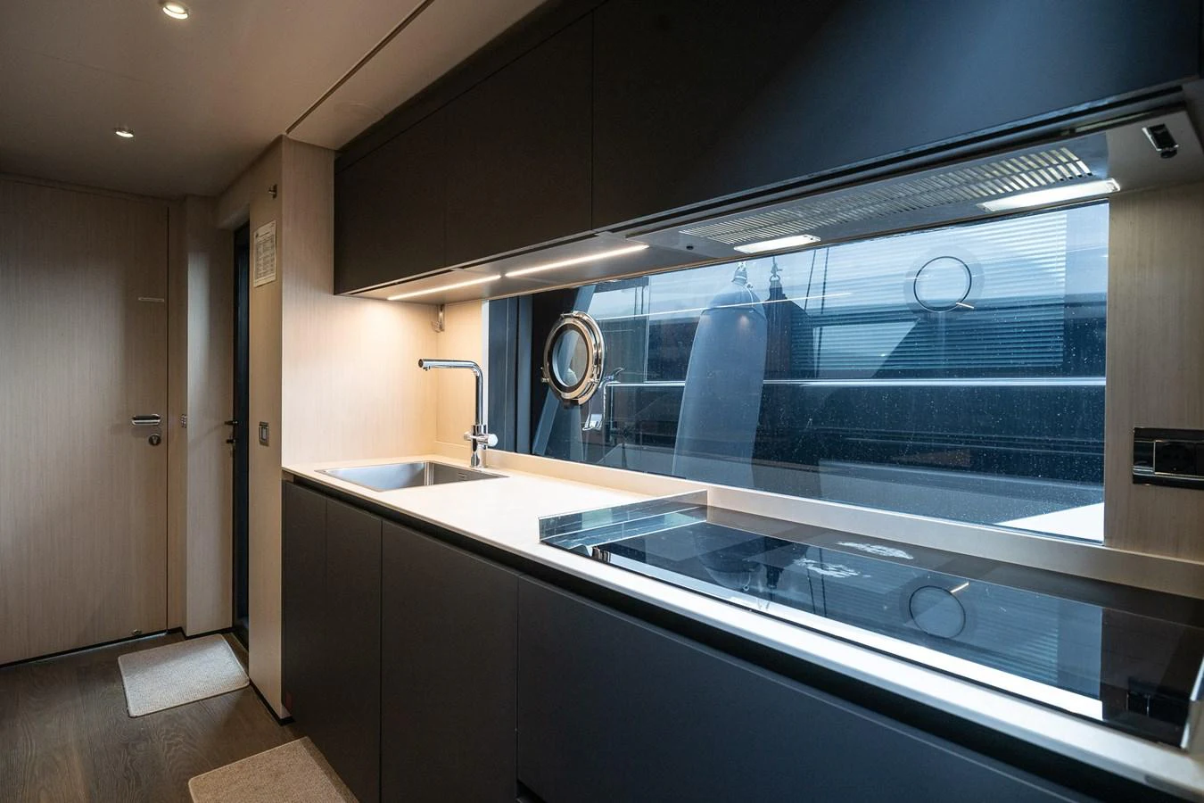 The sleek and modern galley features high-end appliances and ample counter space. aboard FREYA Yacht for Sale