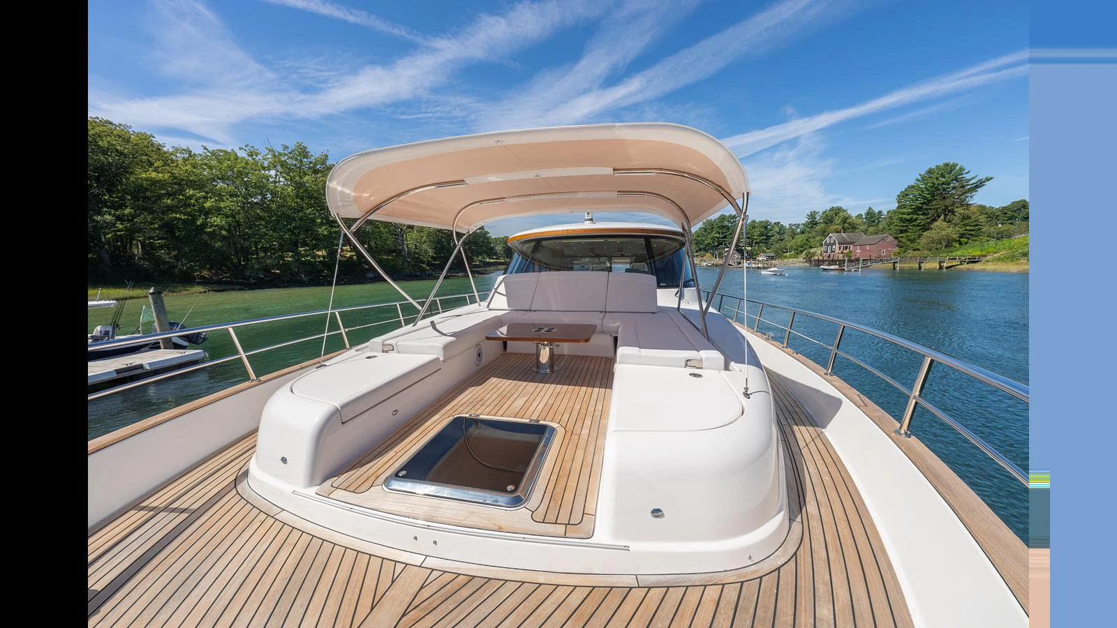 The yacht's spacious foredeck features a sunshade and ample seating, perfect for relaxation. aboard LYRICA Yacht for Sale
