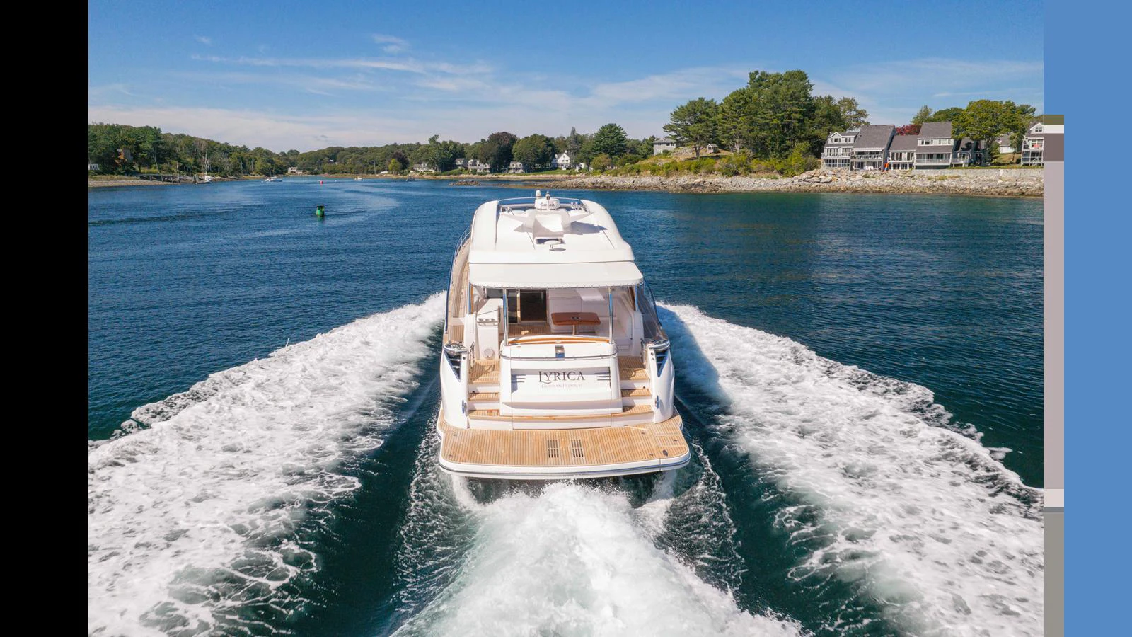 The yacht cruises through serene waters, leaving a trail of white wake behind. aboard LYRICA Yacht for Sale