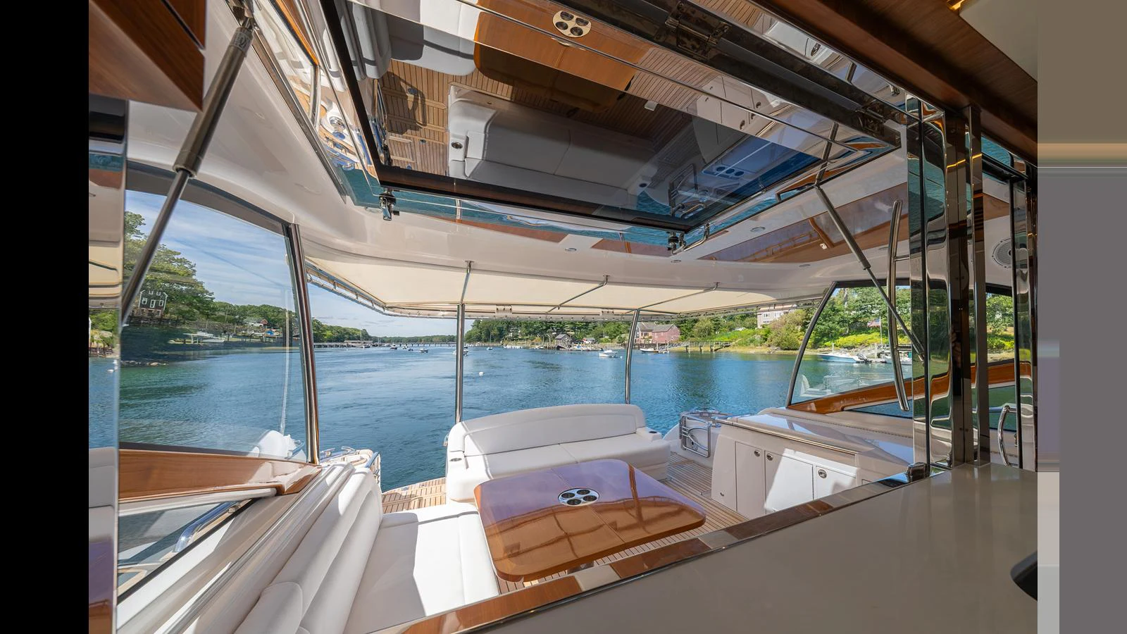 The aft deck offers a luxurious and open space with stunning water views, perfect for relaxation and entertaining. aboard LYRICA Yacht for Sale