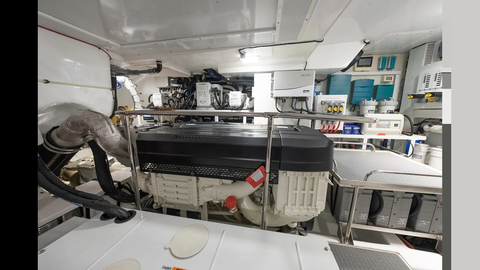 The image showcases the well-organized engine room of the yacht, highlighting its advanced machinery and systems. aboard LYRICA Yacht for Sale
