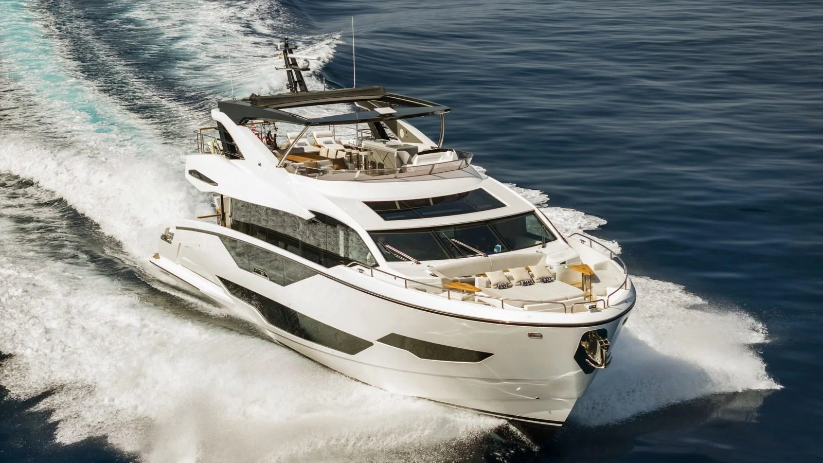 A sleek, modern yacht cruises swiftly through the water, showcasing its elegant design and spacious deck areas. aboard W OF JERSEY Yacht for Sale