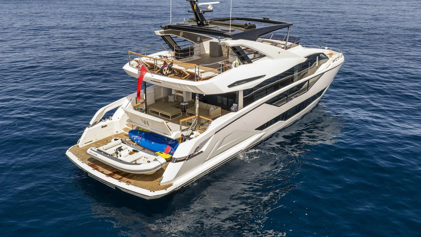 A sleek and modern yacht with an inviting aft deck, perfect for relaxation and water activities. aboard W OF JERSEY Yacht for Sale