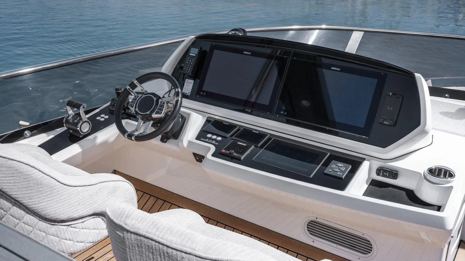 The helm station features state-of-the-art navigation equipment and luxurious seating. aboard W OF JERSEY Yacht for Sale