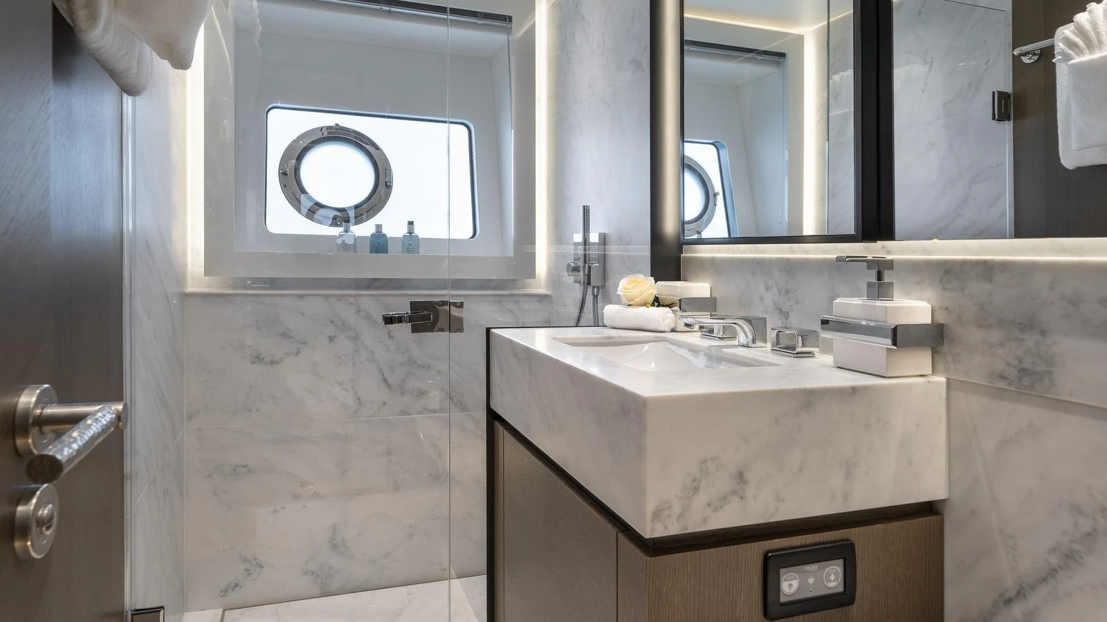 The yacht's bathroom features elegant marble surfaces and modern fixtures. aboard W OF JERSEY Yacht for Sale