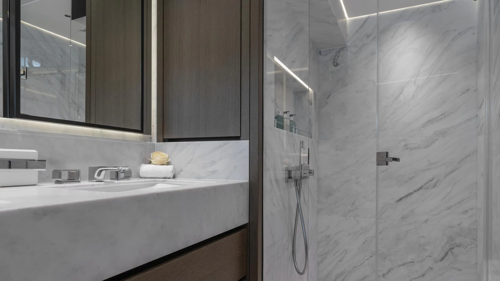 The yacht's bathroom features elegant marble surfaces and modern fixtures. aboard W OF JERSEY Yacht for Sale