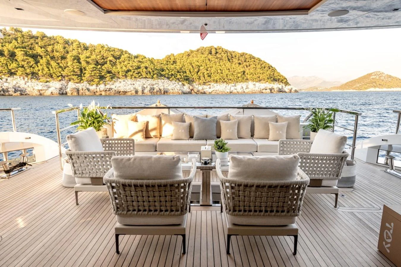 The aft deck features a stylish and comfortable seating area with a stunning view of the surrounding waters. aboard TOY Yacht for Sale