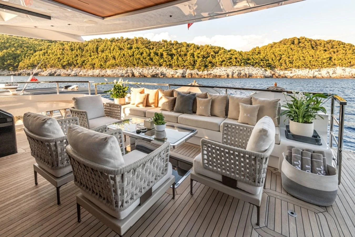 The aft deck offers a luxurious seating area with stunning views of the surrounding waters. aboard TOY Yacht for Sale