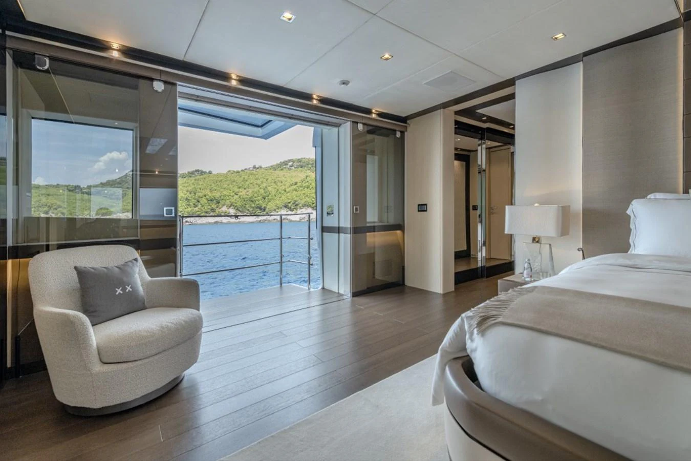 The master stateroom offers a luxurious and serene retreat with stunning ocean views. aboard TOY Yacht for Sale