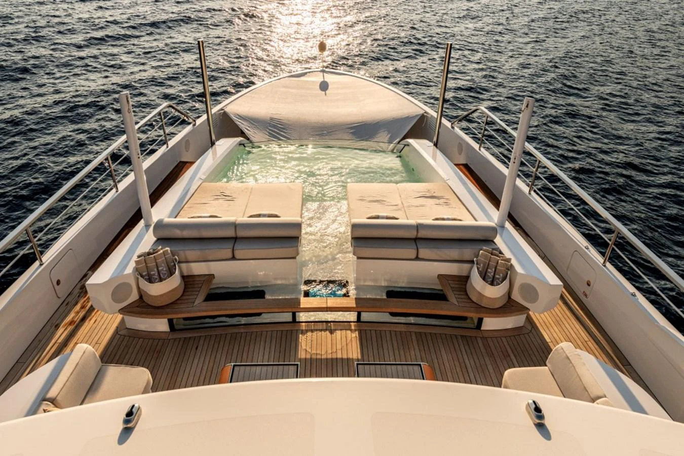 The sundeck features luxurious sun loungers and a refreshing pool, perfect for relaxation. aboard TOY Yacht for Sale