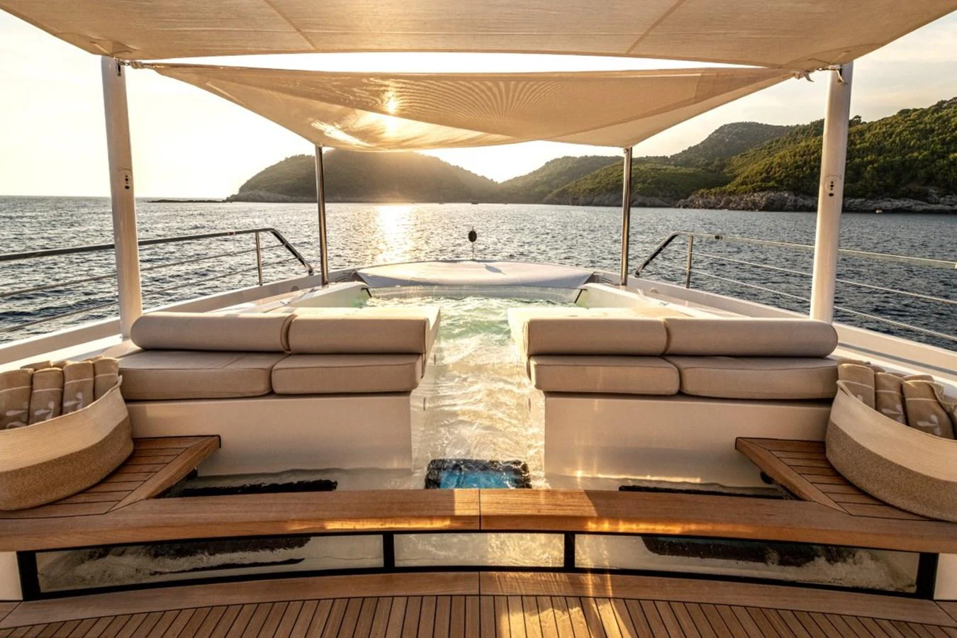 The sundeck features a luxurious jacuzzi with comfortable seating and stunning sea views. aboard TOY Yacht for Sale