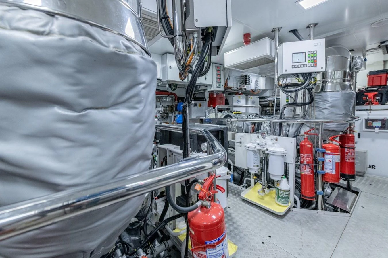 The engine room is equipped with advanced machinery and safety equipment, ensuring optimal performance and security. aboard TOY Yacht for Sale