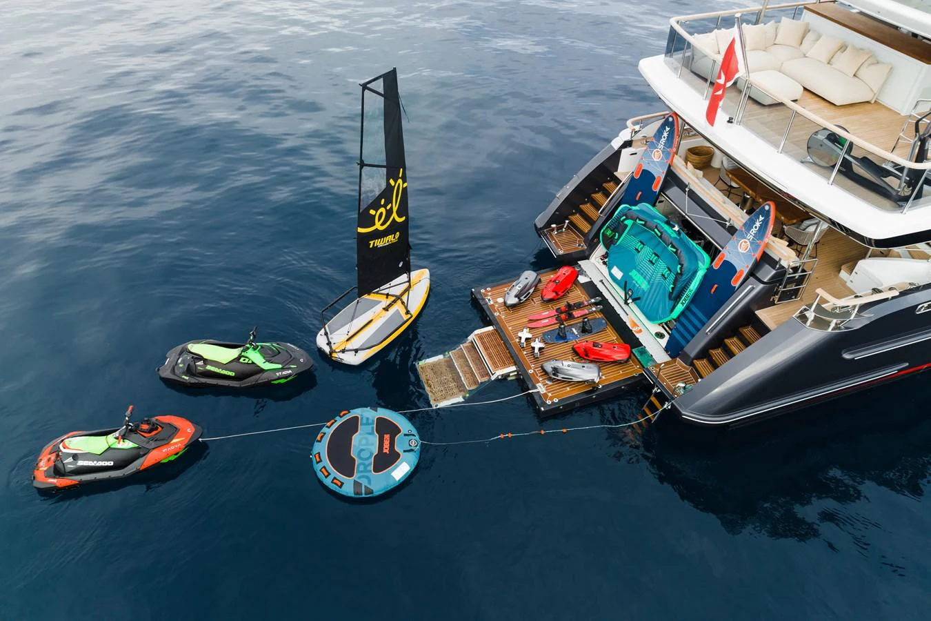 The yacht's aft deck is equipped with an array of water toys and a comfortable lounging area, perfect for enjoying the sea. aboard ADVA Yacht for Sale
