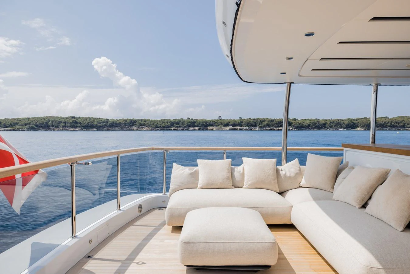 The aft deck features a luxurious lounging area with plush seating and stunning ocean views. aboard ADVA Yacht for Sale