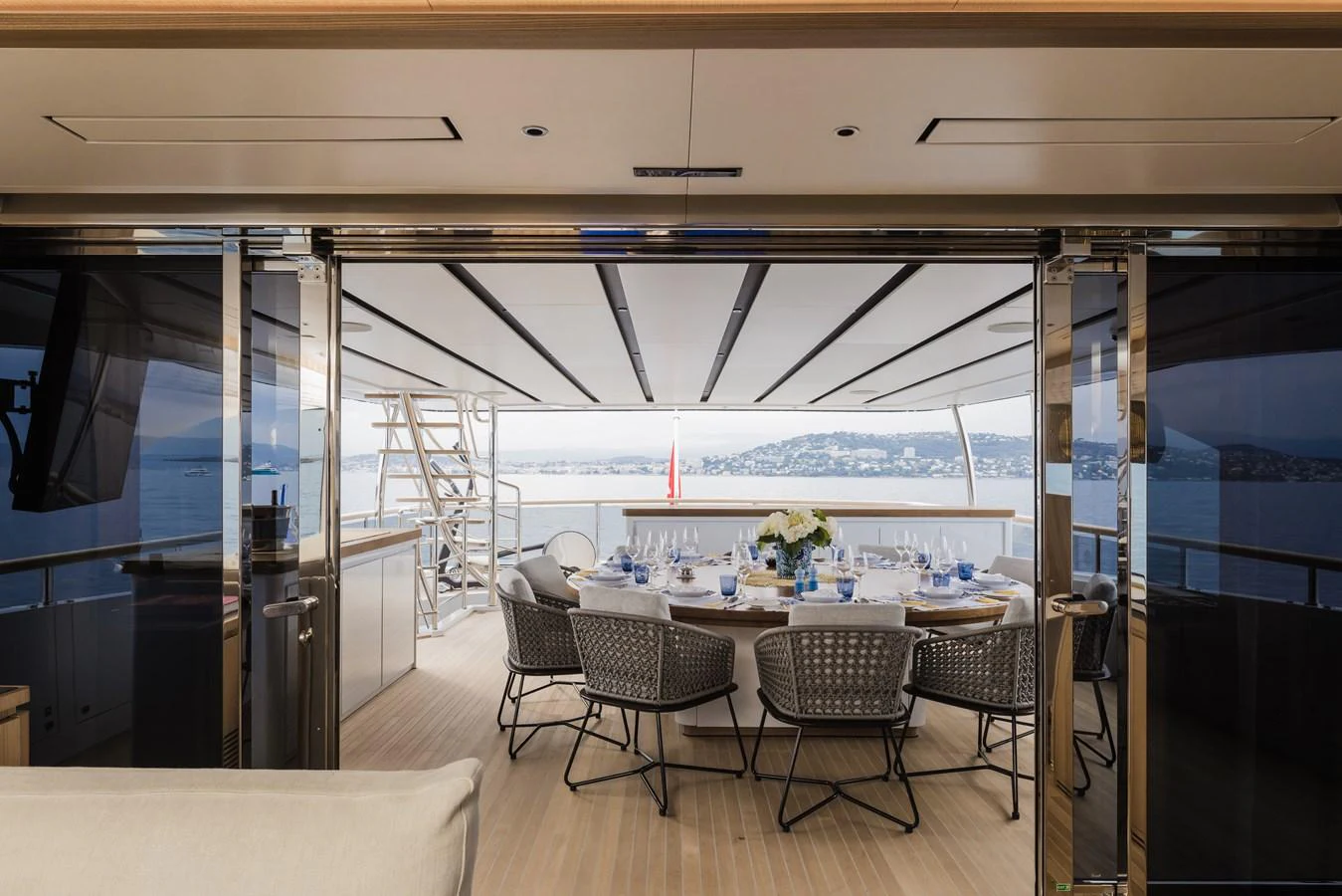 An elegant dining area on the yacht offers stunning views of the surrounding waters. aboard ADVA Yacht for Sale