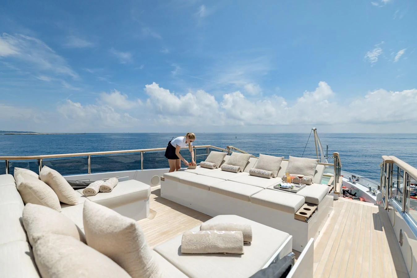 The sundeck offers a luxurious lounging area with plush seating and stunning ocean views. aboard ADVA Yacht for Sale