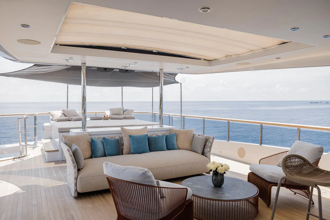 The aft deck offers a luxurious outdoor lounging area with comfortable seating and stunning ocean views. aboard ADVA Yacht for Sale