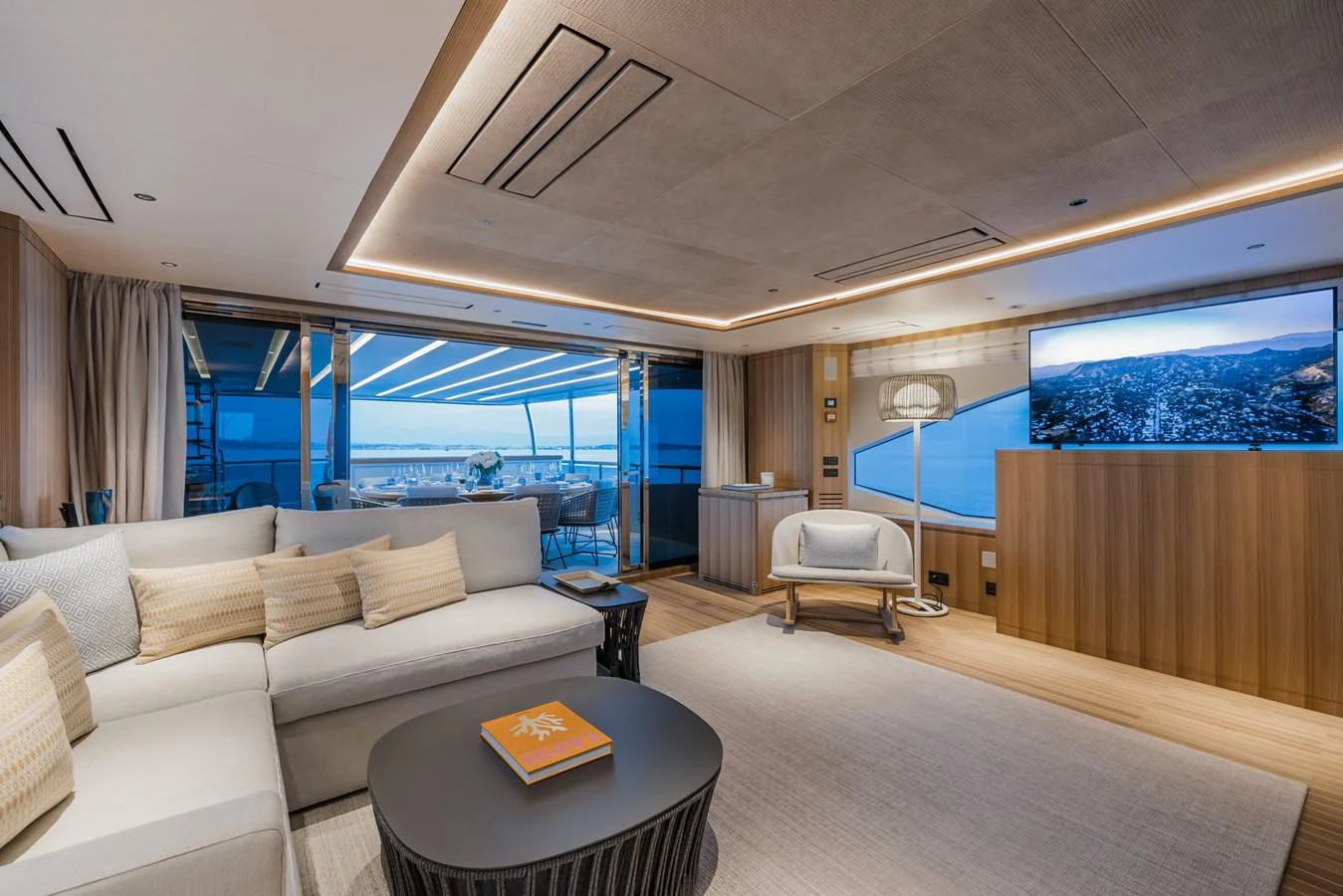 The yacht's salon offers a spacious and modern living area with panoramic views. aboard ADVA Yacht for Sale